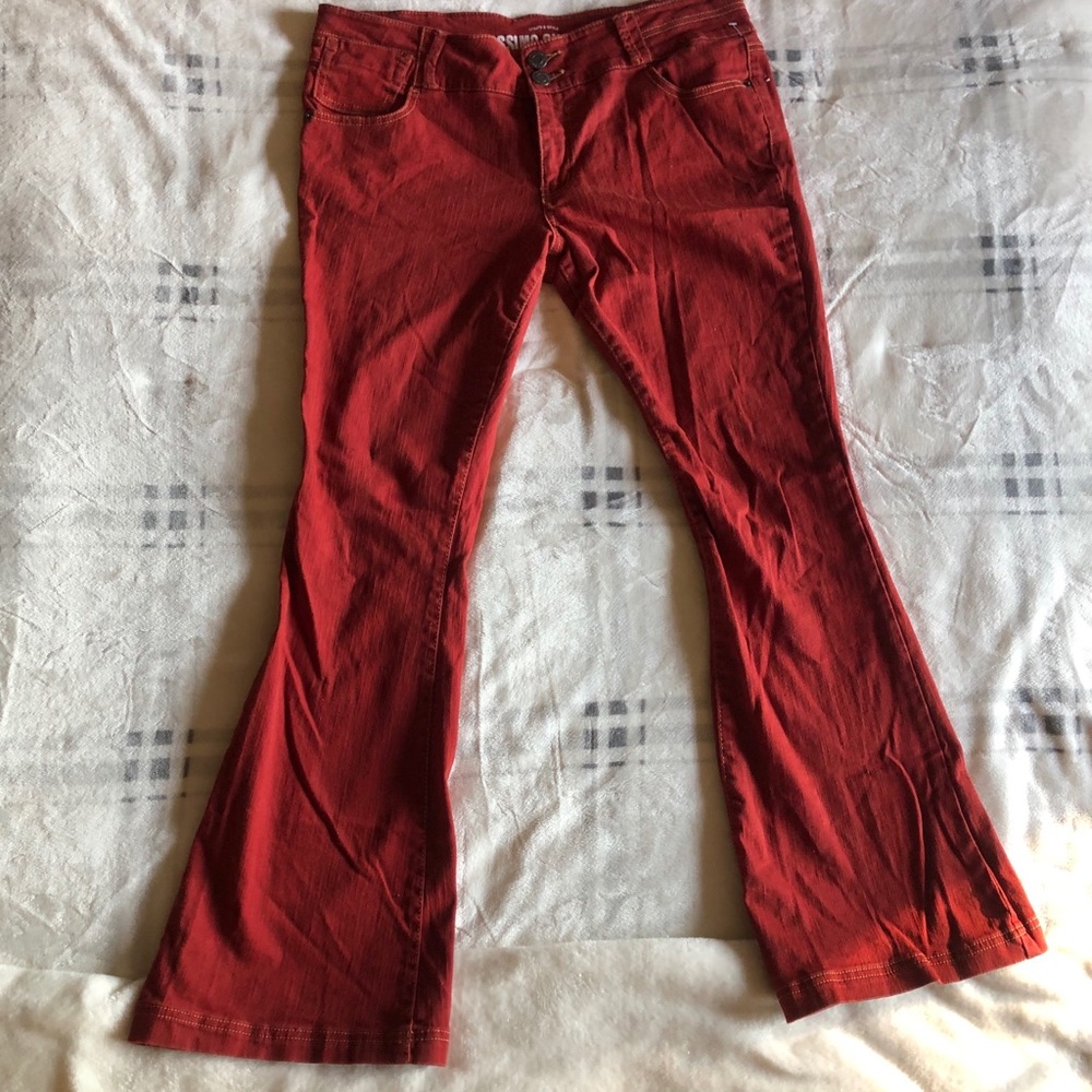 Red/burnt orange flare pants